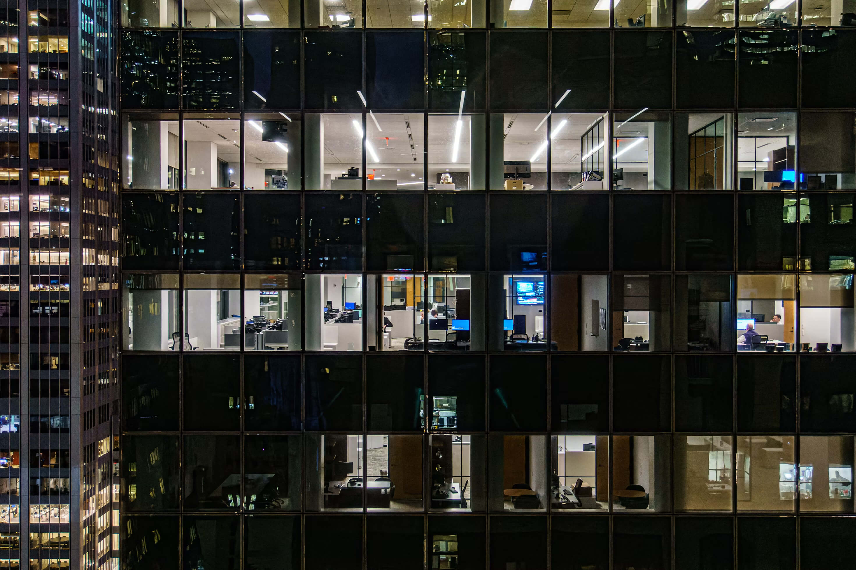 R&D cost segregation – office building at night symbolizing RDIG’s service that accelerates depreciation and delivers immediate tax savings